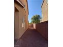 Side yard with gravel and block wall, providing privacy at 7155 Steele Canyon St, Las Vegas, NV 89118