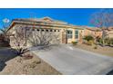 Charming single story home with a two car garage and desert landscaping at 7992 Barntucket Ave, Las Vegas, NV 89147