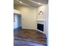 Living room featuring hardwood floors, recessed lighting, and a modern fireplace at , Henderson, NV 89014