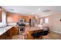 Modern kitchen with stainless steel appliances and granite countertops at 1300 Sand Castle Ave, Las Vegas, NV 89183