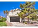 Charming two-story home featuring a spacious driveway, mature trees, and a well-maintained front yard at 2133 Linden Tree St, Las Vegas, NV 89156