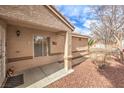 Charming front porch with decorative columns and space for outdoor seating at 2153 Hookcross Cir, Henderson, NV 89074