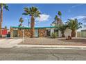 Charming single-story home with unique stone accents and desert landscaping at 3212 Sundown Dr, Las Vegas, NV 89169