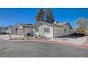 Side view of a lovely one-story home, with a charming stone accent at 4815 Palacio Ct, Las Vegas, NV 89122