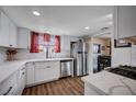 Updated kitchen featuring stainless steel appliances, stylish backsplash, and stainless steel appliances at 4815 Palacio Ct, Las Vegas, NV 89122