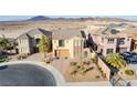 Stunning aerial view of a home with beautiful desert landscaping at 500 Via Stretto Ave, Henderson, NV 89011