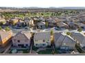 Aerial view of a well-maintained neighborhood with lush green spaces at 500 Via Stretto Ave, Henderson, NV 89011