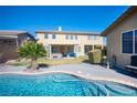 Inviting swimming pool with a spa and spacious backyard at 7435 Sun Summit Ct, Las Vegas, NV 89178