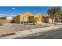 Landscaped yard with gravel and drought-tolerant plants at 7666 Rainbow Cove Dr, Las Vegas, NV 89131