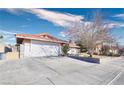 This home includes a spacious two-car garage and a long driveway, perfect for car enthusiasts at 3826 S Torrey Pines Dr, Las Vegas, NV 89103