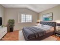 Large main bedroom with king-size bed and ample natural light at 1800 Edmond St # 252, Las Vegas, NV 89146