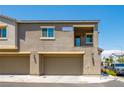 Two-story townhome with attached garage and balcony at 4495 Violet Flowers St # 2046, North Las Vegas, NV 89031