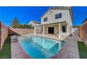 Backyard featuring a refreshing pool, perfect for relaxing and entertaining guests at 6027 Stone Hollow Ave, Las Vegas, NV 89156