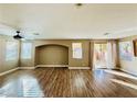 Spacious living room with hardwood floors and access to backyard at 773 Valley Rise Dr, Henderson, NV 89052