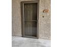 Close-up of the front door, providing secure entry to the home and a welcoming appearance at 8250 N Grand Canyon Dr # 1040, Las Vegas, NV 89166