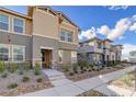 Attractive two-story home with neutral colors, well-maintained landscaping, and a welcoming entrance at 1132 Ruby Sparrow St, Henderson, NV 89011