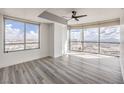 Bright bedroom with large windows, offering panoramic views of the city skyline and abundant natural light at 200 W Sahara Ave # 2108, Las Vegas, NV 89102