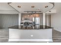 Modern kitchen featuring granite countertops, stainless steel appliances, and custom cabinetry at 200 W Sahara Ave # 2108, Las Vegas, NV 89102