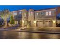 Elegant two-story residence boasting a stone facade and well-maintained front yard with two-car garage at 2796 Rosenhearty Dr, Henderson, NV 89044