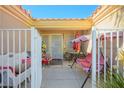 Inviting front porch with seating area and charming decor, perfect for relaxing outdoors at 3157 Faiss Dr, Las Vegas, NV 89134