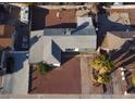 Overhead shot depicting a single story home's roof, driveway and the adjacent desert landscaping at 4312 Alpine Pl, Las Vegas, NV 89107