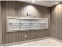 Mail center with wall-mounted mailboxes and neutral wall coverings at 50 E Serene Ave # 123, Las Vegas, NV 89123