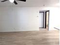 Open living room features new flooring and neutral walls providing a blank canvas at 5121 Lindell Rd # 104, Las Vegas, NV 89118