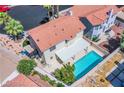 Aerial view of backyard with a refreshing private pool and a covered patio area at 3205 Antilles Ct, Las Vegas, NV 89117