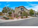 Beautiful home with desert landscaping, inviting curb appeal, and a welcoming entrance at 7856 Pyramid Peak St, Las Vegas, NV 89166