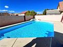 Outdoor swimming pool featuring clean cool blue water and bordering concrete at 1269 Honey Lake St, Las Vegas, NV 89110