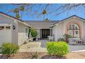 Charming single-story home featuring a well-manicured front yard and cozy front patio area at 3181 Shadow Bluff Ave, Las Vegas, NV 89120