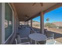 Large covered patio with ceiling fans perfect for outdoor dining at 814 Lake Hill Dr, Boulder City, NV 89005