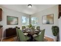 Cozy dining room with seating for six and bright natural lighting at 1810 N Decatur Blvd # 201, Las Vegas, NV 89108