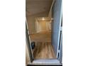 View from entry into living area with vaulted ceilings and neutral carpet at 8000 W Badura Ave # 2021, Las Vegas, NV 89113