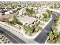 Expansive aerial view of a large house in a neighborhood, boasting lush landscaping and a prime location at 861 Majestic Ridge Ct, Henderson, NV 89052