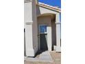 A lovely house front with a modern door and desert landscaping for low maintenance appeal at 9328 Jumpin Juniper Ave, Las Vegas, NV 89129