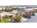 Aerial view of a well-planned neighborhood showcasing multiple homes with well-kept lawns and desert landscaping at 9527 Havasu Canyon Ave, Las Vegas, NV 89166