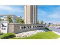 Entrance sign for Skye Canyon, featuring stone accents, landscaping, and a clear community marker at 9527 Havasu Canyon Ave, Las Vegas, NV 89166