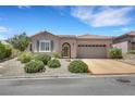 Well-maintained single-story home with desert landscaping, charming shutters, and a spacious two-car garage at 2756 Strathblane Ave, Henderson, NV 89044