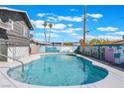 Backyard featuring a refreshing in-ground pool perfect for relaxation and entertaining at 308 Fox Cir, Las Vegas, NV 89107