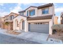 Charming two-story home with a two-car garage and desert landscaping in a residential neighborhood at 8045 Sundance Valley Dr, Las Vegas, NV 89178