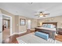 Spacious main bedroom featuring hardwood floors, walk-in closet, and ensuite bathroom at 9435 Westwind Rd, Las Vegas, NV 89139