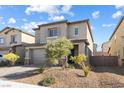 Beautiful two-story house with desert landscaping and a two-car garage at 2740 Aldine Ct, Las Vegas, NV 89142