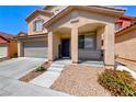 Inviting front porch and well-maintained yard welcome you to this lovely home at 5507 Nickel Ridge Way, Las Vegas, NV 89122