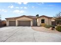 Charming single-story home with a three-car garage, landscaped front yard, and inviting entrance at 8145 Mountain Forest Ct, Las Vegas, NV 89129