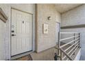 Apartment entryway with security system and welcome mat at 3150 Soft Breezes Dr # 2022, Las Vegas, NV 89128