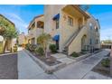 Two-story home with desert landscaping, secure access and maintained sidewalks at 4722 Obannon Dr # D, Las Vegas, NV 89102