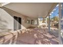 Spacious covered patio with ample room for outdoor seating and entertaining at 1 Rising Sun Ct, Henderson, NV 89074