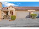 Welcoming single story home with a well manicured yard and an attached two car garage at 9304 Cranesbill Ct, Las Vegas, NV 89149