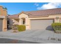 Lovely single-story home with an attached two-car garage and desert landscaping at 9304 Cranesbill Ct, Las Vegas, NV 89149